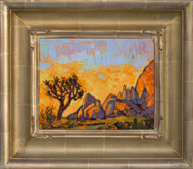This petite oil painting captures Joshua Tree National Park in vibrant color and thick brush strokes. The warm colors in the sky are reflected in the unique shapes of the granite boulders, and the single Joshua Tree stands starkly against the cadmium sky.</p><p>This painting was done on 3/4"-deep stretched canvas. It has been framed in a hand-carved frame accented with 22kt gold leaf. Read more about the <a href="https://www.erinhanson.com/Blog?p=AboutErinHanson" target="_blank">painting's details here.</a>