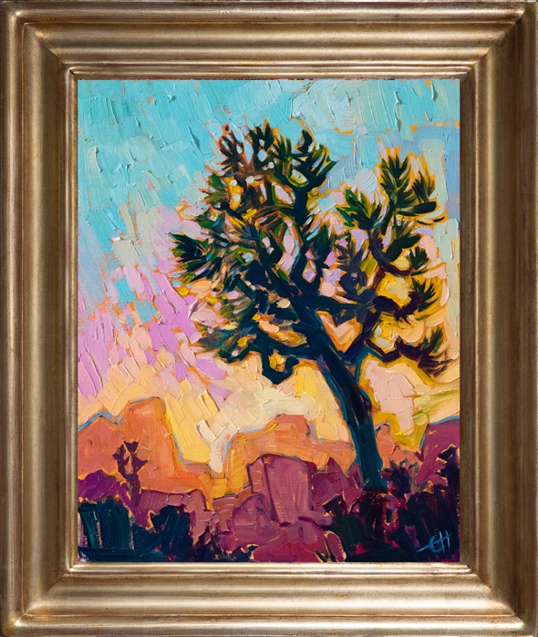 Experience the vivid colors of the desert in this painting of Joshua Tree National Park. The sky is awash in all the colors of sunset, illuminating the granite boulders with touches of pink and rainbow sherbet. The brush strokes are loose and impressionistic, conveying the emotional picture of the desert.</p><p>"Joshua Sunset" was created on 1/8" linen board. The piece arrives framed in a gilded plein air frame, ready to hang.