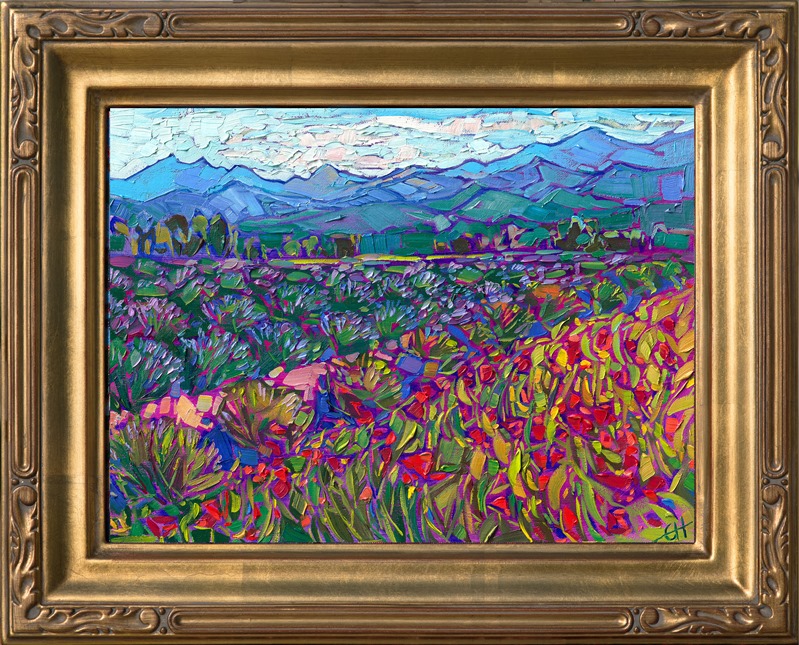 This northwestern oil painting captures rows of cultivated lavender fields and red poppies growing beneath the distant blue coastal mountains. This petite oil painting arrives framed in a plein air frame, ready to hang.