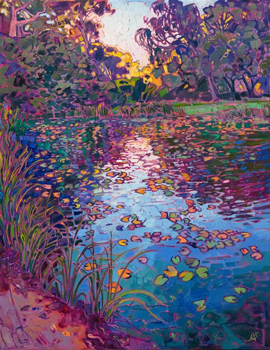 The still waters of a lilies pond reflect the colors of late afternoon light. This painting was inspired by the gardens in the Norton Simon Museum in Pasadena. The impressionist brush strokes capture the fleeting light of the scene.</p><p>"Lilies Reflection" was created on 1-1/2" canvas, with the painting continued around the edges. The painting arrives framed in a contemporary gold floating frame, ready to hang.