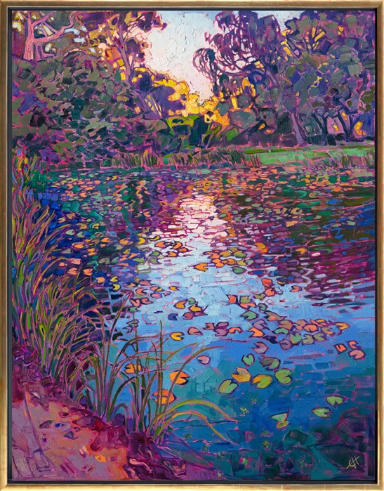 The still waters of a lilies pond reflect the colors of late afternoon light. This painting was inspired by the gardens in the Norton Simon Museum in Pasadena. The impressionist brush strokes capture the fleeting light of the scene.</p><p>"Lilies Reflection" was created on 1-1/2" canvas, with the painting continued around the edges. The painting arrives framed in a contemporary gold floating frame, ready to hang.