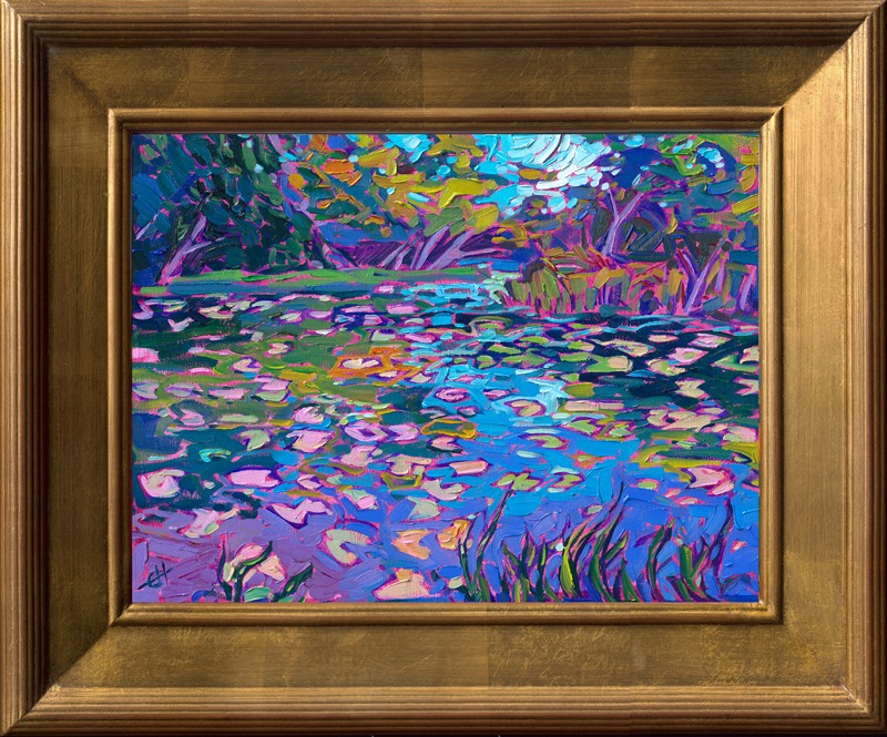Multi-colored light glows on the surface of the lily pond, catching the green leaves and swirling in the waters. The brush strokes are loose and impressionistic, capturing the fleeting light of the scene.</p><p>"Lily Reflections" was created on linen board, and the petite oil painting arrives framed in a gold plein air frame.