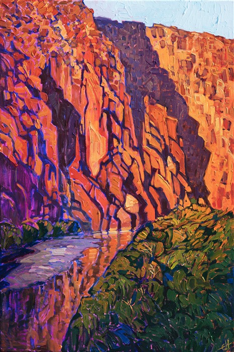 The dramatic limestone canyons of Big Bend National Park are most beautiful just at sunset when the cliffs turn multi-hued shades of vermillion and orange. The still waters of the Rio Grande catch the gilded reflection of the cliffs. This painting was created with thick, impasto brush strokes, adding a dimension of texture to the piece.

This painting will be on display at the Museum of the Big Bend, during the solo exhibition <i><a href="https://www.erinhanson.com/Event/MuseumoftheBigBend" target="_blank">Erin Hanson: Impressions of Big Bend Country.</a></i> This painting will be ready to ship after January 10th, 2019. <a href="https://www.erinhanson.com/Portfolio?col=Big_Bend_Museum_Show_2018">Click here</a> to view the collection.

This painting has been framed in a custom-made gold frame. The painting arrives ready to hang.