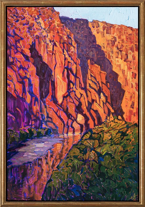 The dramatic limestone canyons of Big Bend National Park are most beautiful just at sunset when the cliffs turn multi-hued shades of vermillion and orange. The still waters of the Rio Grande catch the gilded reflection of the cliffs. This painting was created with thick, impasto brush strokes, adding a dimension of texture to the piece.</p><p>This painting will be on display at the Museum of the Big Bend, during the solo exhibition <i><a href="https://www.erinhanson.com/Event/MuseumoftheBigBend" target="_blank">Erin Hanson: Impressions of Big Bend Country.</a></i> This painting will be ready to ship after January 10th, 2019. <a href="https://www.erinhanson.com/Portfolio?col=Big_Bend_Museum_Show_2018">Click here</a> to view the collection.</p><p>This painting has been framed in a custom-made gold frame. The painting arrives ready to hang.