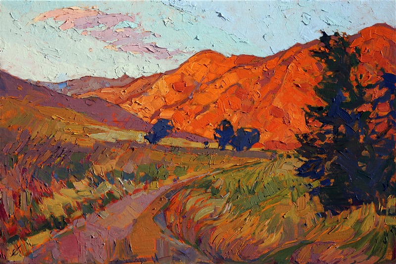 Mandarin-orange light is reflected off these layers of hills, a bold contrast against the smaller oaks and fir trees. This idyllic country painting captures one of those fleeting moments of peaceful beauty that lasts only a minute during a beautiful sunset. Thick brush strokes of oil paint create a mosaic of color and texture within the painting.
