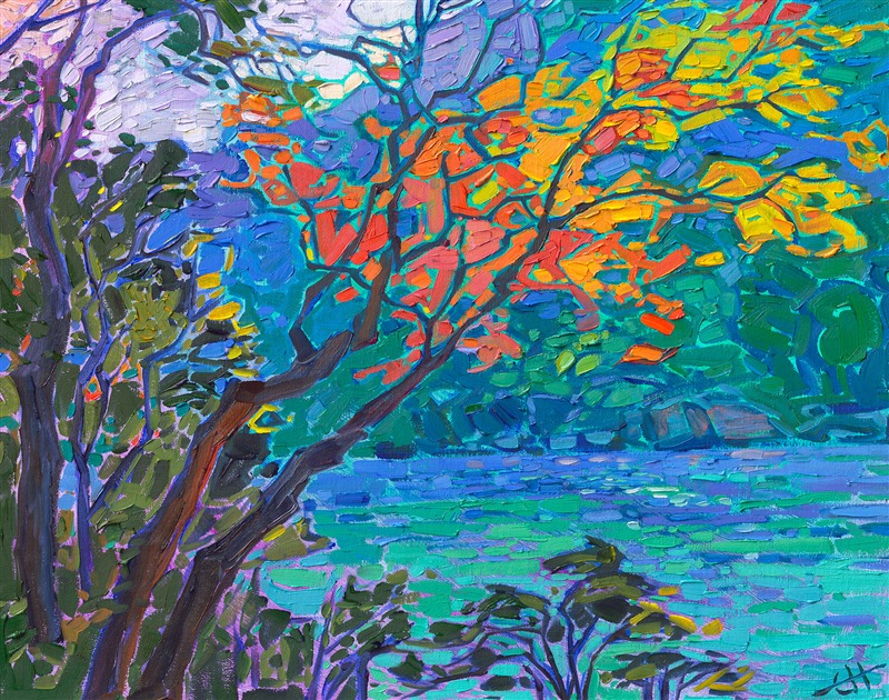 This Japanese maple tree is aglow in all the vibrant colors of autumn. The tree hangs over a wide, slow river in Japan called Arashiyama. The far bank is blue and turquoise in the distance, the perfect backdrop to the colors of the maple tree.</p><p>"Maple Blues" is an original oil painting on linen board. The piece arrives framed in a gold plein air frame, ready to hang.