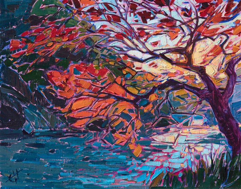 A mosaic pattern of light shines through this back-lit maple tree that hangs over a slow-moving river in Kyoto, Japan. The delicate branches and vibrant color of the maple tree gleam with contrast and light against the dark green backdrop.</p><p>This painting was created on linen board, and it arrives framed in a gold or black plein air frame, ready to hang.