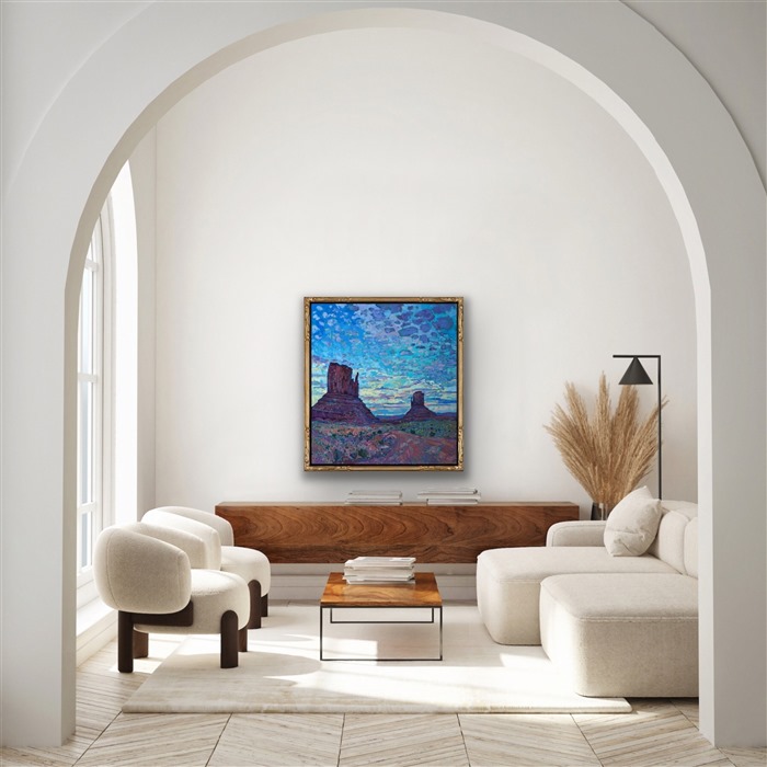 Anyone who has seen a sunset over Monument Valley will never forget it.  As the world slowly darkens and the landscape hushes, the sky celebrates the closing of another day with brilliant hues and cloud formations.  This painting captures that transient moment in time with thick, impasto brush strokes and expressionistic color.</p><p>This painting was done on 1-1/2" canvas, with the painting continued around the edges.  It has been framed in a gilded and hand-carved floater frame.</p><p>--- </p><p>Monument Valley<br/><B>F U N   F A C T S</B></p><p>Formed during the Permian period (50 million years before dinosaurs roamed the earth), this patch of land once formed part of a seafloor where sediments and sandstone piled up in layers for millions of years. The Valley is now a sacred place for the Navajo, whose mythology holds that these grand spires contain the spirits of Najavo warriors. Monument Valley is found on the Navajo National Reservation. </p><p>The Valley is also one of the most filmed spots in the history of filmmaking. The valley was hailed "John Wayne country" for appearing in no less than five of his movies. It also served as a backdrop for an iconic scene in Forest Gump. </p><p>"There are certain places in the world that seem like special effects, they don't seem real," said film historian Scott Eyman. "They're too perfect. And the first time you come here, you see it through John Ford's eyes." (Ford is widely regarded as one of the most important and influential film-makers in history.)</p><p>--</p><p>This painting was a part of the <a href="https://www.erinhanson.com/Event/redrock2018" target=_blank"><i>The Red Rock Show</i></a> in San Diego in 2018.  <a href="https://www.erinhanson.com/Portfolio?col=The_Red_Rock_Show_2018" target="_blank"><u>Click here</u></a> to view the other Red Rock paintings.<br/>