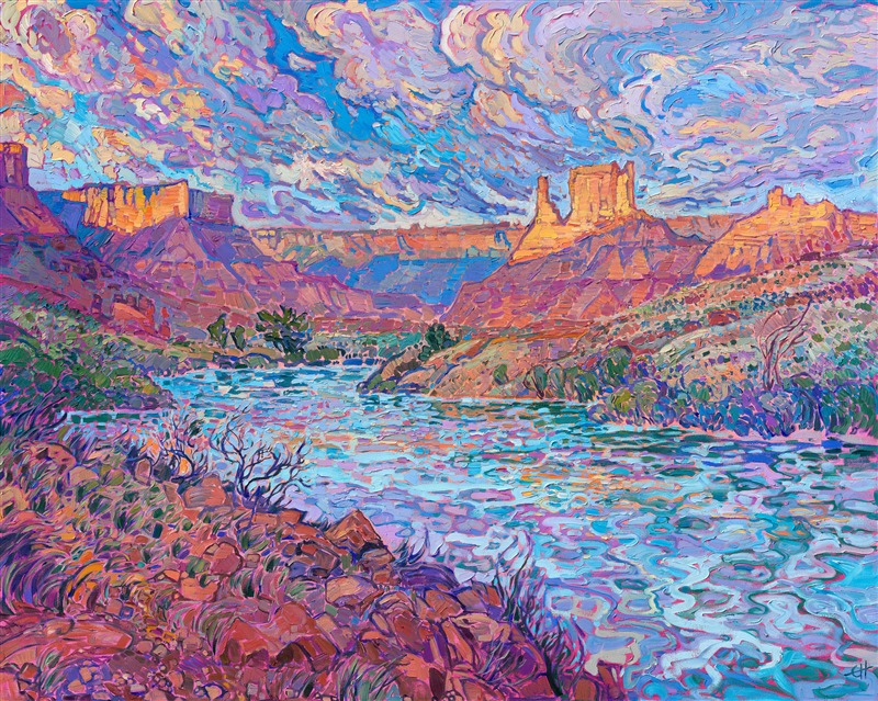 Moab is a popular destination for red rock landscape lovers across the world. Moab is at the entrance to Arches National Park and is also the gateway to accessing the Colorado River and Fisher Towers. The entire landscape looks like an Erin Hanson painting from sunrise to sunset, changing colors from blue and purple to hot orange and deep red and finally to soft pastels at dusk.

This painting captures the beautiful vistas seen from alongside the Colorado River, a few miles from Moab.

This painting was exhibited at <i>Erin Hanson: Landscapes of the West </i> solo museum exhibition at the Sears Art Museum in St. George, Utah.