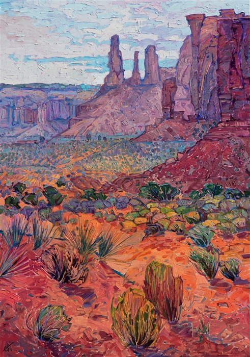 Monument Valley, located at the Four Corners region on the Colorado Plateau, is one of the most dramatic national monuments in the Southwest. The striking red rock buttes and spires loom up from the desert floor, made of seeming fragile sandstone, and yet withstanding the eons. This scene from Monument Valley is captured in thick, impressionistic brush strokes, in Hanson's signature Open Impressionism style.</p><p>This painting was created on 1-1/2" canvas, with the painting continued around the edges of the canvas. The piece has been framed in a gold floater frame and arrives ready to hang.