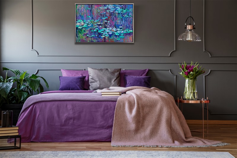 This painting of Monet's water lily pond captures the shimmering effect of moonlight against water lilies. The thick texture of the oil paint adds dimension and rhythm to the tranquil reflections. The rich color palette in this painting makes it the perfect addition to any room.