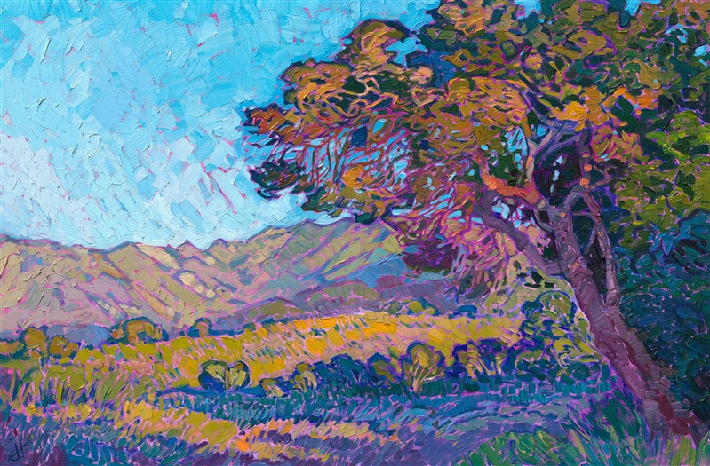 Warm afternoon light hits the boughs of the oak tree, glimmering with a multitude of hues. The distant mountain range curves softly in the distance, bordering the grassy plains. The brush strokes in this painting are loose and impressionistic, alive with color and motion.

This painting was created on 1-1/2" canvas, with the painting continued around the edges of the piece. The painting has been framed in a custom gold floater frame.

This painting was exhibited in <i><a href="https://www.erinhanson.com/event/ErinHansonAmericanVistas" target="_blank">Erin Hanson: American Vistas</i></a> at the Nancy Cawdrey Studios and Gallery in Whitefish, Montana, 2019.