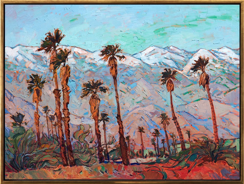 This painting captures a unique view of the iconic Palm Springs desert surrounded by snow-capped mountains. The California desert is not typically equated with snowy peaks but on rare occasions, the San Jacinto Mountains offer a rare and spectacular view for the desert lovers below. The colors of this piece are dynamic yet serene with the texture jumping right off the canvas. </p><p>This painting was created on 1-1/2" canvas, with the painting continued around the edges.  The piece arrives framed in a gold floater frame, ready to hang.