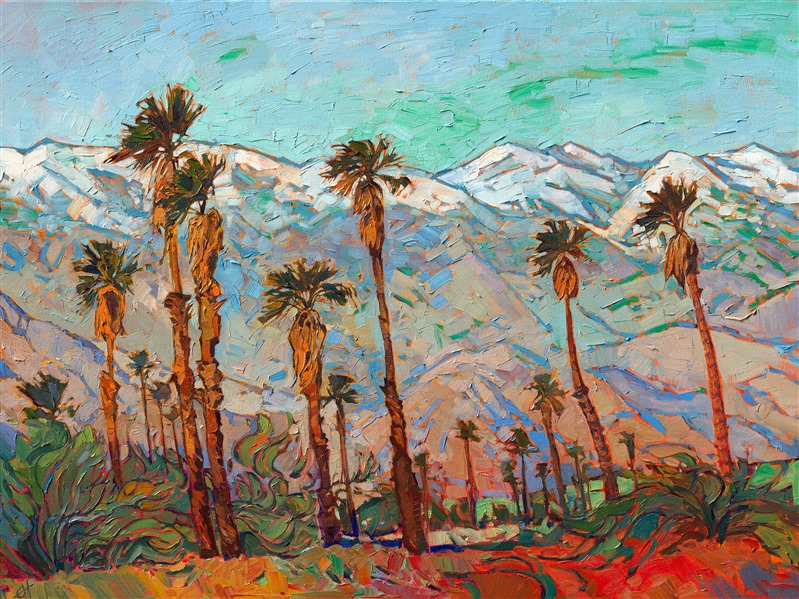 This painting captures a unique view of the iconic Palm Springs desert surrounded by snow-capped mountains. The California desert is not typically equated with snowy peaks but on rare occasions, the San Jacinto Mountains offer a rare and spectacular view for the desert lovers below. The colors of this piece are dynamic yet serene with the texture jumping right off the canvas. 

This painting was created on 1-1/2" canvas, with the painting continued around the edges.  The piece arrives framed in a gold floater frame, ready to hang.