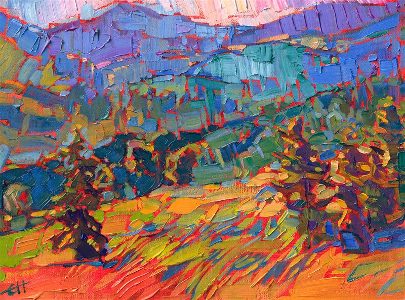 This petite painting captures the wide expanse of a northwestern mountain range with few brush strokes and impressionistic pops of color. The summer golds and mountain blues are a beautiful contrast.</p><p>"Northern Range" is an original oil painting on linen board, measuring 9x12 inches. The painting arrives framed in a closed corner, plein air frame, ready to hang.