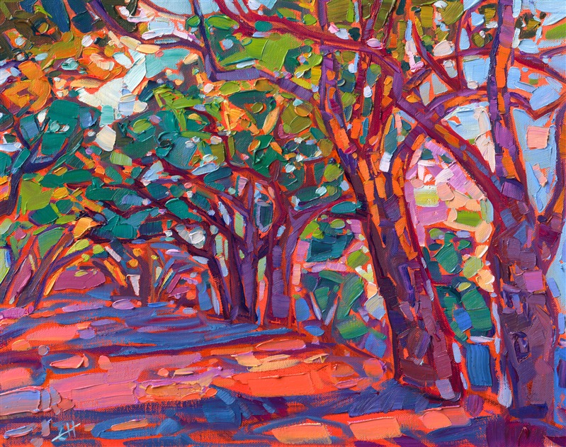 A row of California oaks create abstract patterns of light and color over the shaded pathway. The brush strokes are loose and expressive, alive with color and movement.</p><p>"Oaken Color" is an original oil painting created on linen board. The painting arrives framed in a black and gold plein air frame.