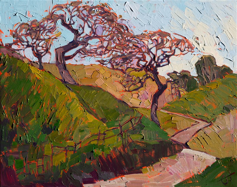 Entwined oak trees stand sentry next to this country road in Paso Robles, California.  The summer grasses seem to radiate warmth, while the loose brush strokes keep the painting fresh and alive with motion.

This oil painting was created on 3/4" stretched canvas, and it arrives framed and ready to hang. The second photograph above shows how the painting looks hanging in gallery spot lighting.
