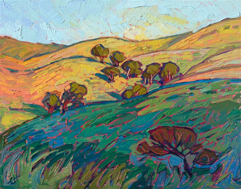 A collection of California oaks dances up the curving surfaces of the spring-green hills, glowing warmly in the early morning sunlight. The brush strokes are thick and impressionistic, creating a mosaic of color and texture across the canvas.</p><p>This painting was created on linen board, and it arrives ready to hang in a custom-made frame.</p><p>This painting was exhibited in <i><a href="https://www.erinhanson.com/Event/ErinHansonAmericanVistas/" target="_blank">Erin Hanson: American Vistas</i></a> at the Nancy Cawdrey Studios and Gallery in Whitefish, Montana, 2019.