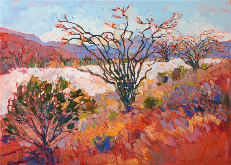 The ocotillo is one of the stately beauties of the Western desert, its abstract spidery stalks reaching high into the sky. The bird-like red blooms come alive in the springtime, bringing a bolt of surprising color into the desert landscape.</p><p>This painting was created on 1-1/2" canvas, with the painting continued around the edges of the gallery-wrap canvas. This artwork has been framed in a beautiful hardwood floater frame, and it arrives wired and ready to hang.