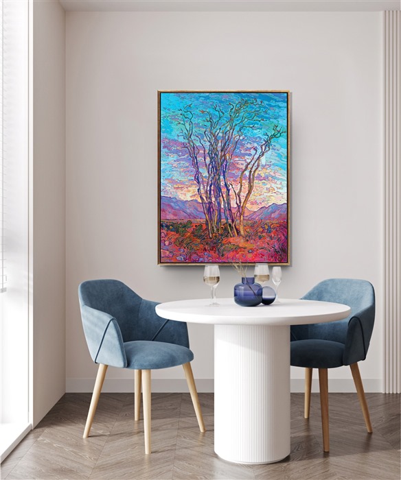The ocotillo is an iconic desert plant in southern California and Arizona. The tall, stately ocotillo is most beautiful in spring, when it is covered in tiny green leaves and bright red flowers burst from the ends of each stalk. This painting captures a scene from the Mojave Desert, in Joshua Tree National Park.</p><p>"Ocotillo Sunset" is an original oil painting on stretched canvas. The piece arrives framed in an elegant gold floater frame, ready to hang.