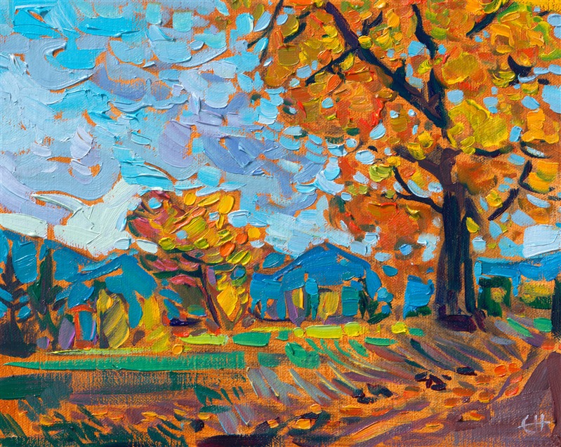 This petite work on linen board captures the beauty of Oregon's Willamette Valley in the fall. Rich hues of orange and gold stand out against a gray-blue October sky. Impressionism is the perfect style to capture fleeting moments of color and light.</p><p>"Oregon October" is an original oil painting on linen board. The piece arrives framed in a wide, mock floater frame, so you don't lose any of the painting behind the edge of a frame. </p><p>This piece will be displayed in Erin Hanson's annual <i><a href="https://www.erinhanson.com/Event/petiteshow2023">Petite Show</i></a> in McMinnville, Oregon. This painting is available for purchase now, and the piece will ship after the show on November 11, 2023.