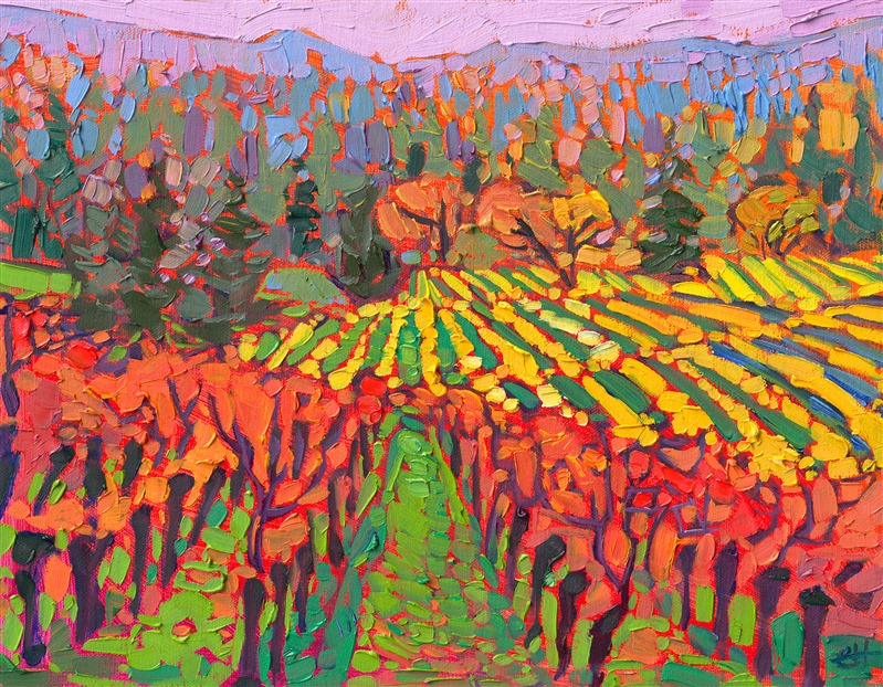 Oregon's wine country is most beautiful in October when all the grapevines turn hues of cadmium orange and yellow. The grass grows apple green between the vineyard rows, creating starkly beautiful patterns in the landscape.</p><p>"Oregon Vines" is a petite oil painting, created on fine linen board. The piece arrives framed in a black and gold plein air frame, ready to hang.