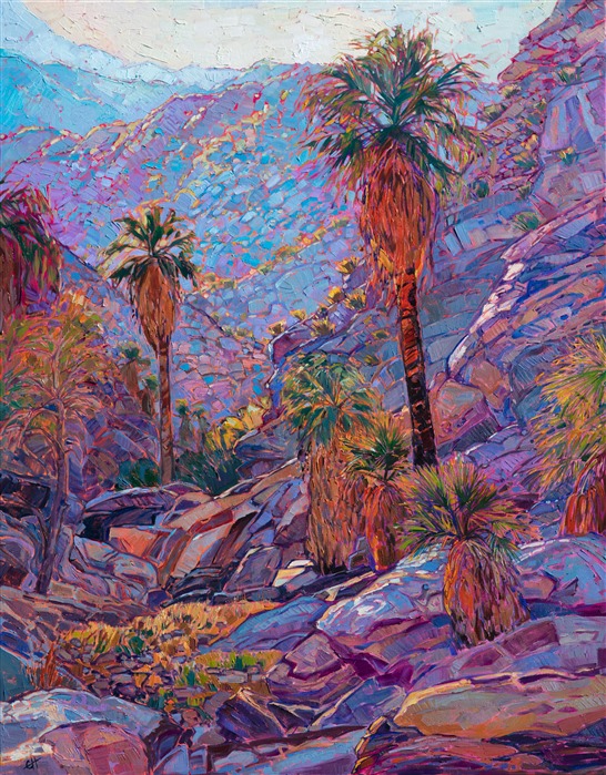 This painting was inspired by one of the side canyons off the Palm Canyon hike at Indian Canyons in Palm Springs. The light illuminating the far side of the rocky mountains, back-lighting the small desert shrubs and palms, beckoned me to scramble over a series of slick boulders to catch a better look.</p><p>This piece was created on 1-1/2" canvas, and it arrives framed in a custom-made gold floater frame, ready to hang.