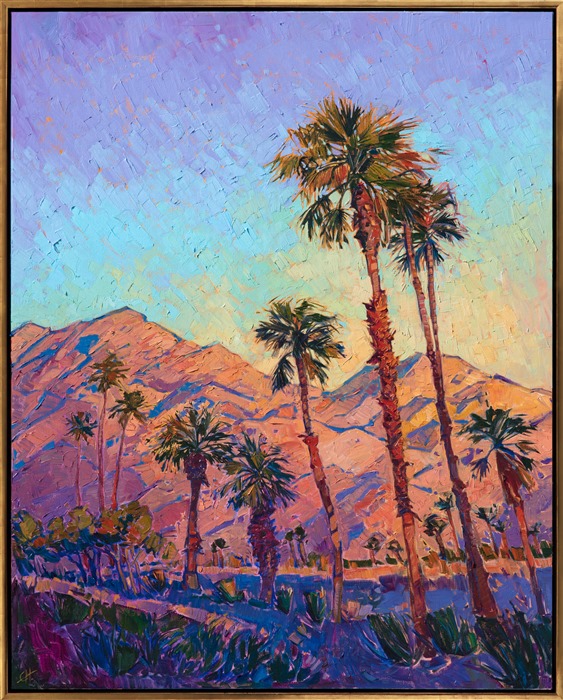 Desert palm trees catch the early morning light, turning warm shades of cadmium and sherbet, while the sky above slowly turns color from purple to blue. Each brush stroke is alive with texture and color, while capturing the serenity and peace of the desert landscape.</p><p>This painting was done on 1-1/2" canvas, with the painting continued around the edges of the canvas.  The piece has been framed in a simple, 23kt gold floating frame.