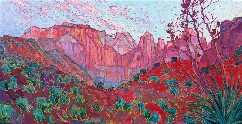 About the painting:<br/>Waiting behind the Zion Human History Museum in the dark before dawn, I watched the sky slowly lighten into hues of pink and pale blue. The distant Court of the Patriarchs finally caught the light of sunrise, glowing deep and rich with saturated color. </p><p>"Patriarch Sunrise" was created on gallery-depth canvas, with the painting continued around the edges. The piece arrives framed in a contemporary gold floater frame.
