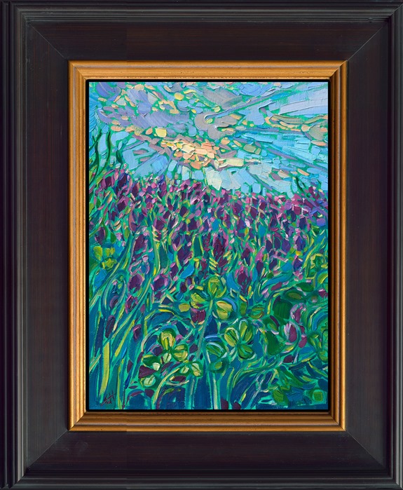 This petite work captures the purple clover fields that bloom all around Oregon's Willamette Valley every spring. The dramatic cloudscape filters the light down upon the colorful scene.</p><p>"Purple Clover" is an original oil painting on linen board. The piece arrives framed in a mock floater frame finished in black with gold edging.