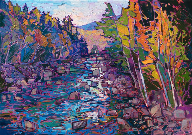A picturesque babbling brook tumbles down the mountain slope, capturing the early morning light dawning over the White Mountains in New Hampshire. Abstract shapes capture the color of the autumn foliage, and the impasto paint strokes are alive with motion.</p><p>"River Rocks" was created on 1-1/2" canvas, with the painting continued around the edges. The piece arrives framed in a gold floating frame. 