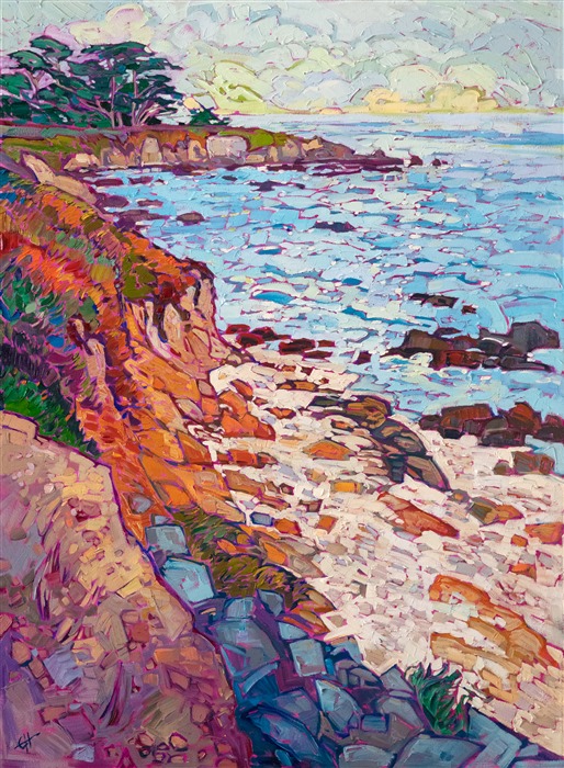 The white sands of Pebble Beach are a beautiful contrast to the sandy orange cliffs and multi-colored ice plants that grow along the tops. The brush strokes are loose and impressionistic, alive with color and motion.</p><p>"Rocky Sands" was created on 1-1/2" canvas, with the painting continued around the edges. The piece arrives framed in a contemporary gold floater frame.