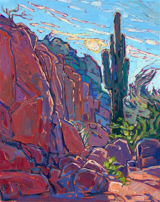 A saguaro cactus on Camelback Mountain near Scottsdale, Arizona, is captured in thick, expressive brush strokes and impressionistic color. The red rock boulders turn hues of purple and blue in the shadows.</p><p>"Saguaro Boulders" is an original oil painting on linen board. The piece arrives framed in a black and gold plein air frame, ready to hang.<br/>