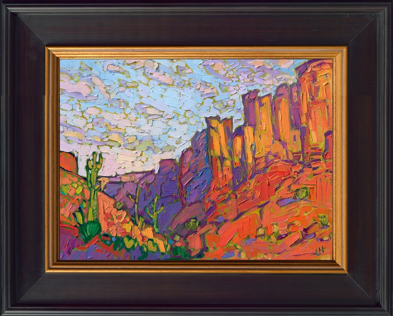 The American West is painted in iconic colors of orange, purple and green. The thick, impressionistic brush strokes capture the texture of the sandstone buttes. Each brush stroke fits together on the painting like a mosaic made of oil paint. </p><p>"Saguaro Buttes" is an original oil painting created on fine linen board. The piece arrives framed in a gold plein air frame. 