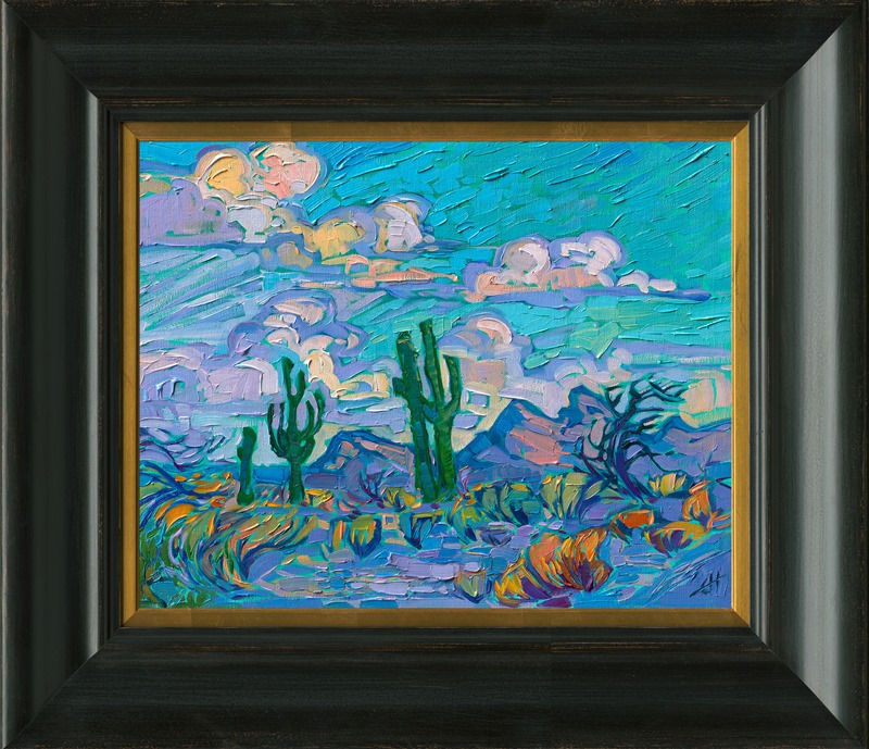 Thick brush strokes of oil paint capture the motion and brilliance of a summer sky above Arizona saguaros. The green underpainting makes the warm colors in the painting glow with contrast.</p><p>"Saguaro Greens" was created on 1/8" linen board, and the piece arrives framed in a gold plein air frame.