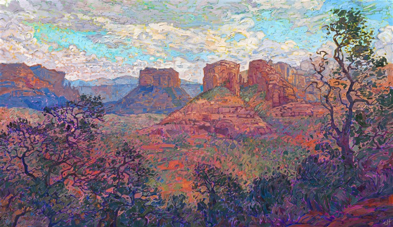 The beautiful red rock vista of Sedona stretches across the horizon, bathing the eyes in sun-drenched color.  The thickly applied brush strokes are loose and impressionistic, capturing the brisk feeling of standing on the edge of the butte and looking out across the valley.</p><p>This painting was created on 1-1/2" canvas, with the painting continued around the edges.  The piece has been framed in a carved gold open impressionist frame.</p><p>This painting exhibited in <a href="https://www.erinhanson.com/Event/redrock2018" target=_blank"><i>The Red Rock Show</i></a> in San Diego in the summer of 2018.  <a href="https://www.erinhanson.com/Portfolio?col=The_Red_Rock_Show_2018" target="_blank"><u>Click here</u></a> to view the other Red Rock paintings.