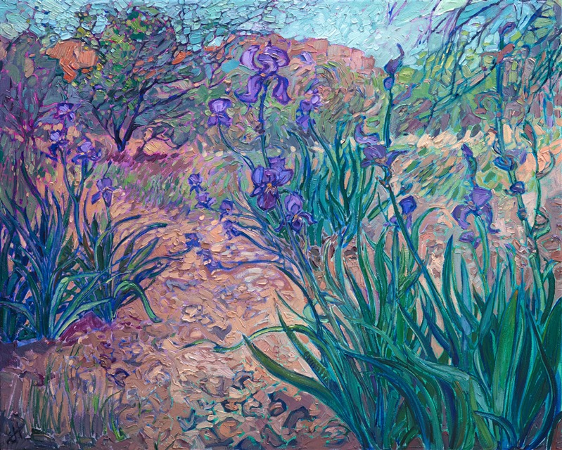 Purple irises bloom unexpectedly near Oak Creek in Sedona, Arizona.  I was immediately drawn to the contrast of the purple and green flowers against the dusky pink desert background.  This piece is also a nod to Vincent van Gogh -- his irises painting was the reason I wanted to be an artist when I started painting in oils at the young age of 8.  I love how an impressionism painting can be more beautiful than real life and capture the vivid color and motion of the outdoors with simple brush and paint.</p><p>This painting was done on 1-1/2" canvas, with the painting continued around the edge of the canvas.  This piece has been framed in a beautiful, hand-carved open impressionist frame.</p><p>This painting will be shown in the <a href="https://www.erinhanson.com/Event/redrock2018" target=_blank"><i>The Red Rock Show</i></a> at The Erin Hanson Gallery, June 16th, 2018.  <a href="https://www.erinhanson.com/Portfolio?col=The_Red_Rock_Show_2018" target="_blank"><u>Click here</u></a> to view the other Red Rock paintings.