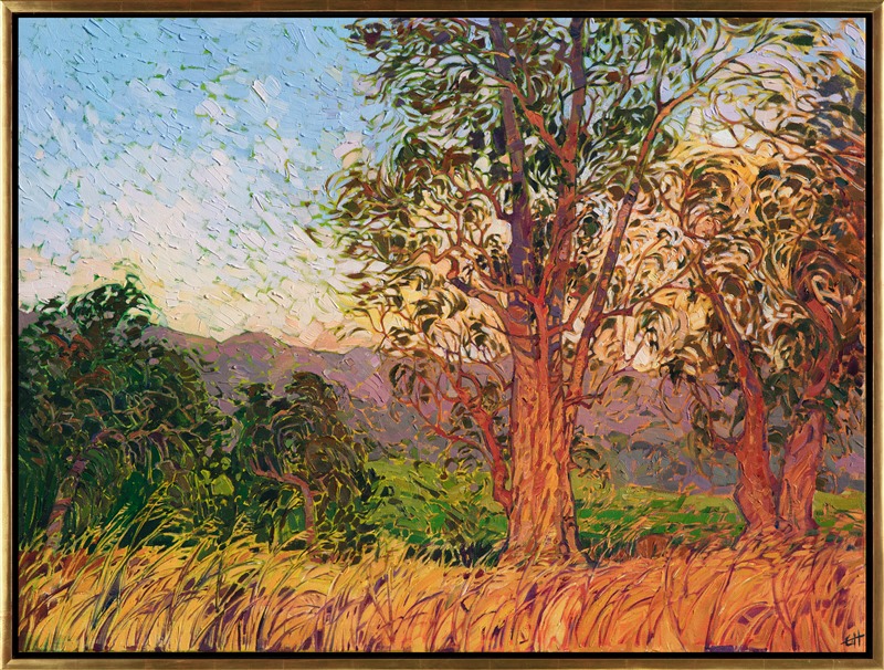 A September morning in Napa, California, found this view of eucalyptus bathing in the warm dawning light. The distant mountains are purple in the morning haze, and golden summer grasses dance in the foreground. The brush-strokes of oil paint are thickly applied and impressionistic, alive with color and texture.</p><p>This painting was created on 1-1/2" canvas, with the painting continued around the edges of the piece. The painting has been framed in a simple gold floater frame.