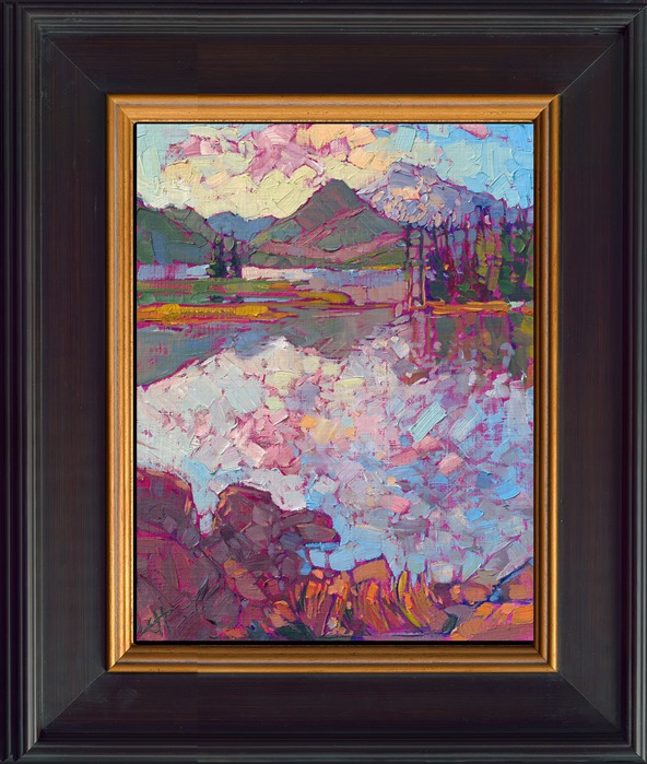 The Oregon Cascades are beautiful in the summer when the range is transformed into a green, idyllic landscape of mountains, lakes, and reflected sunsets. This classic petite is being sold on consignment through The Erin Hanson Gallery.</p><p>"The Cascades" is an original oil painting on canvas board. The piece arrives framed in a black and gold plein air frame, ready to hang.