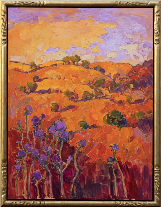 Rich layers of orange paint build up to an exciting depiction of Paso Robles' rolling hills and rounded oak trees. The purple thistles in the foreground stand out in vibrant contrast against the mandarin backdrop of hills. This oil painting was created with juicy, impasto brush strokes and a loose, impressionistic style.</p><p>This painting has been framed in an Open Impressionist frame. These frames are one-of-a-kind, hand carved in the US and hand-gilded with 23kt gold leaf. Read more about the <a href="https://www.erinhanson.com/Blog?p=AboutErinHanson" target="_blank">painting's details here.</a></p><p>Exhibited <a href="https://www.erinhanson.com/Event/ErinHansonTheOrangeShow"><i>The Orange Show</i></a>, The Erin Hanson Gallery, Los Angeles, CA. 2016.