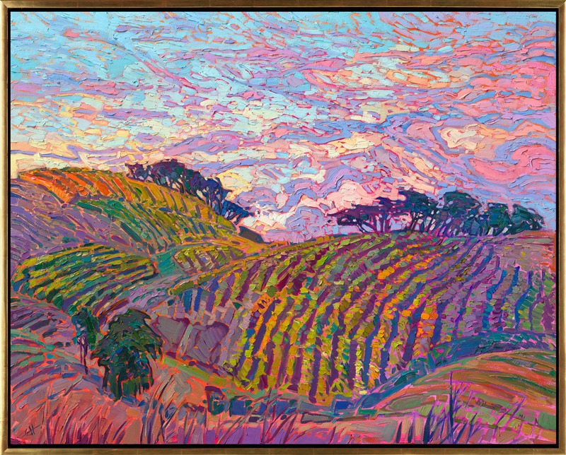 Warm sunset light drenches the landscape in this colorful painting of cultivated vines. The brush strokes are loose and expressive, capturing the feeling of being outside in the open air. </p><p>"Vineyard Color" is an original oil painting created on gallery-depth canvas. The piece arrives framed in a burnished, 23kt gold leaf floater frame with dark sides. 