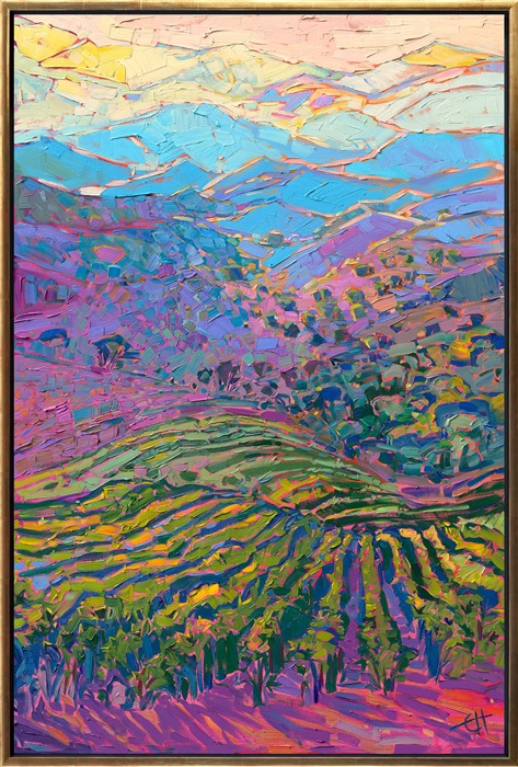 From the heights of Peachy Canyon Vineyards, you can see miles and miles in every direction, in Paso Robles, California. The fading layers of hills catch the late afternoon light, glowing with hues of green and gold. The brush strokes in this oil painting are thick and impressionistic, creating a mosaic of color and texture across the canvas.</p><p>"Vineyard Hills" was created on 1-1/2" canvas, and the painting arrives framed in a contemporary gold floater frame, ready to hang.