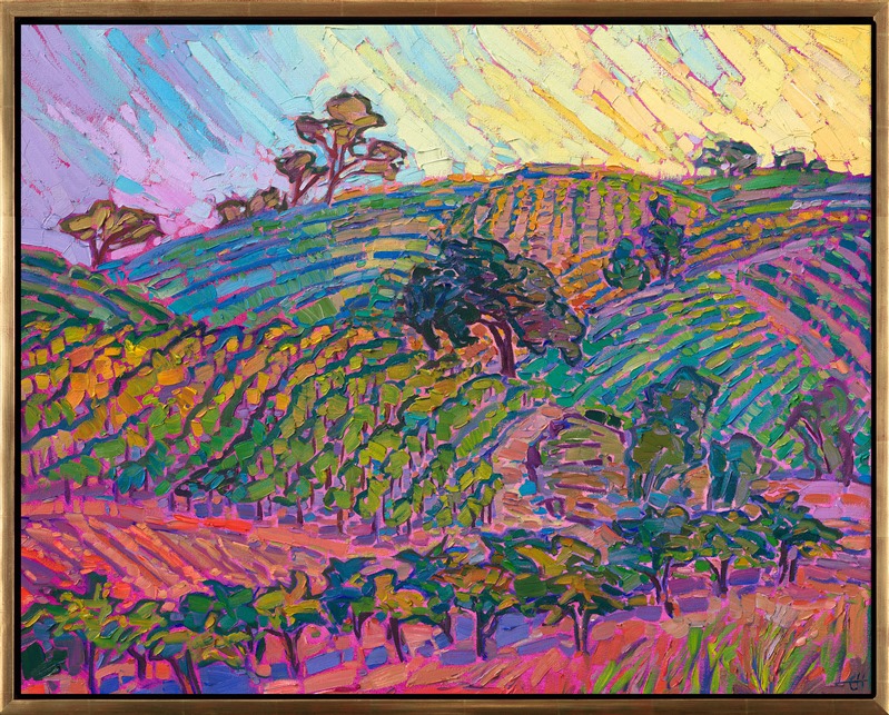 Layers of vineyard-covered hills glow with the colors of sunset in this painting of Paso Robles, California. The wine country in central California is filled with softly rounded hills and ancient oak trees, with enough color to inspire hundreds of paintings!</p><p><b>Please note:</b> This painting will be hanging in a museum exhibition until November 5th, 2023. This piece is included in the show <i><a href="https://www.erinhanson.com/Event/ErinHansonatBoneCreekMuseum">Erin Hanson: Color on the Vine</i></a> at the Bone Creek Museum of Agrarian Art in Nebraska. You may purchase the painting now, but you will not receive the painting until after the show ends. You will receive your painting a week or two before Thanksgiving 2023. </p><p>"Vineyard Light" is an original oil painting created on stretched canvas. The piece arrives framed in a contemporary floater frame finished in burnished 23kt gold leaf.