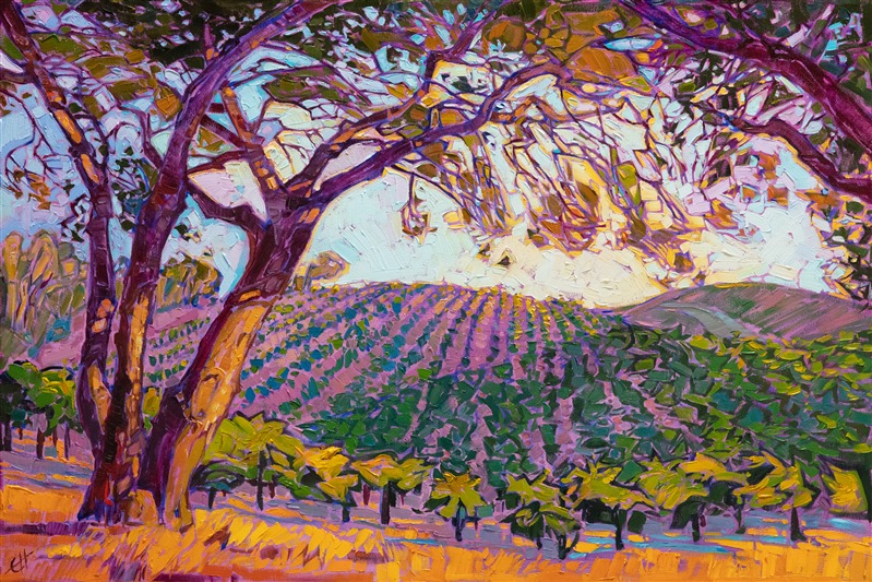 Prismatic, crystalline light filters through the branches of a California oak in this impressionist painting of Paso Robles wine country. The rows of grapevines catch the late afternoon light, transforming from cool shadow purples into warm hues of autumn. </p><p>"Vineyard Oak" was created on 1-1/2" canvas, with the painting continued around the edges. The piece arrives framed in a gold floating frame.