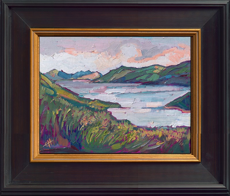 This petite painting captures a lake near Paso Robles and Cambria called Whale Rock Reservoir. The classic California hills surrounding the lake are lush and green in the springtime.</p><p>"Whale Rock Reservoir" is an original oil painting on canvas board. The piece arrives framed in a black and gold plein air frame. This piece from 2013 is being sold on consignment.