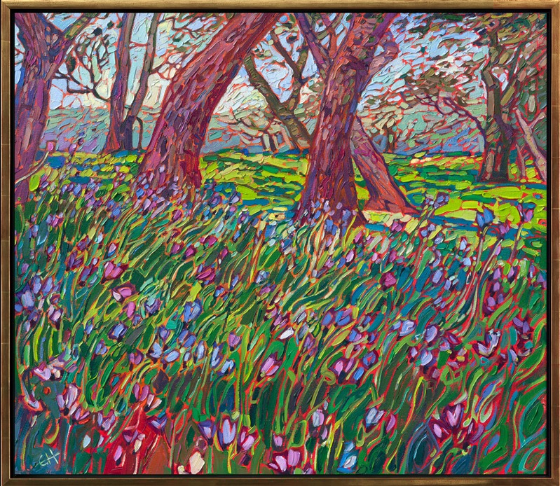 Brightly colored wildflowers glimmer in hues of blue, purple, and lavender, glittering like jewels in the green grass. This painting was inspired by springtime under the oak trees in Paso Robles, California.</p><p>"Wildflower Oaks" is an original oil painting created on gallery-depth canvas. The piece arrives framed in a burnished gold floater frame, ready to hang.