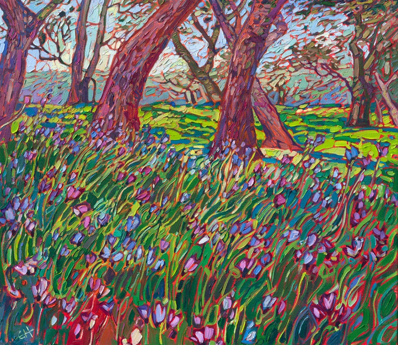 Brightly colored wildflowers glimmer in hues of blue, purple, and lavender, glittering like jewels in the green grass. This painting was inspired by springtime under the oak trees in Paso Robles, California.</p><p>"Wildflower Oaks" is an original oil painting created on gallery-depth canvas. The piece arrives framed in a burnished gold floater frame, ready to hang.