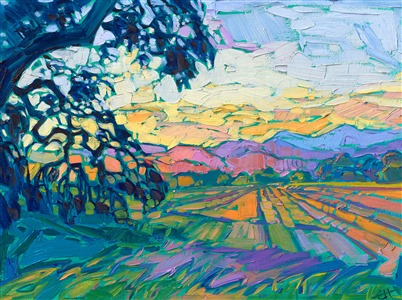 The Willamette Valley in Oregon wine country is captured in vibrant hues of green, apricot, and ochre. The brush strokes are loose and expressive, creating a mosaic of color and texture across the petite canvas.

"Lighted Fields" is an original oil painting on linen board. This piece arrives framed in a custom-made plein air frame (mock floater style, so the edges are uncovered).

This painting will be displayed at Erin Hanson's annual <a href="https://www.erinhanson.com/Event/ErinHansonSmallWorks2022" target=_"blank"><i>Petite Show</a></i> on November 19th, 2022, at The Erin Hanson Gallery in McMinnville, OR.