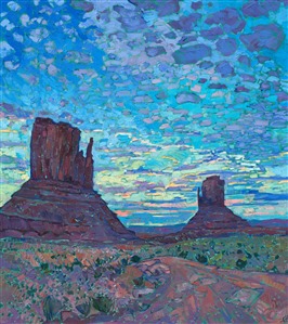 Anyone who has seen a sunset over Monument Valley will never forget it.  As the world slowly darkens and the landscape hushes, the sky celebrates the closing of another day with brilliant hues and cloud formations.  This painting captures that transient moment in time with thick, impasto brush strokes and expressionistic color.

This painting was done on 1-1/2" canvas, with the painting continued around the edges.  It has been framed in a gilded and hand-carved floater frame.

--- 

Monument Valley
<B>F U N F A C T S</B>

Formed during the Permian period (50 million years before dinosaurs roamed the earth), this patch of land once formed part of a seafloor where sediments and sandstone piled up in layers for millions of years. The Valley is now a sacred place for the Navajo, whose mythology holds that these grand spires contain the spirits of Najavo warriors. Monument Valley is found on the Navajo National Reservation. 

The Valley is also one of the most filmed spots in the history of filmmaking. The valley was hailed "John Wayne country" for appearing in no less than five of his movies. It also served as a backdrop for an iconic scene in Forest Gump. 

"There are certain places in the world that seem like special effects, they don't seem real," said film historian Scott Eyman. "They're too perfect. And the first time you come here, you see it through John Ford's eyes." (Ford is widely regarded as one of the most important and influential film-makers in history.)

--

This painting was a part of the <a href="https://www.erinhanson.com/Event/redrock2018" target=_blank"><i>The Red Rock Show</i></a> in San Diego in 2018.  <a href="https://www.erinhanson.com/Portfolio?col=The_Red_Rock_Show_2018" target="_blank"><u>Click here</u></a> to view the other Red Rock paintings.
