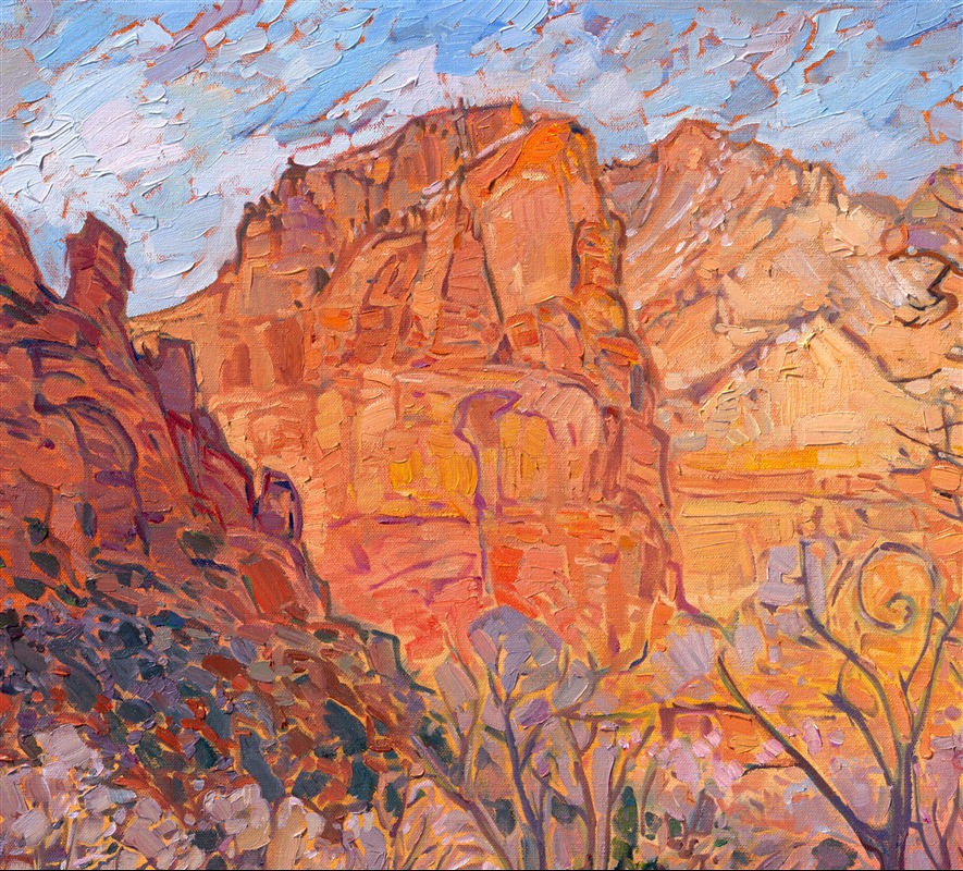 The magical light of Zion National Park in the wintertime is captured in this oil painting by Erin Hanson. The landscape is quiet, all sounds muffled by a recent snowfall. The delicate hues of orange and gold seem to glow with a light of their own. Each brushstroke feels fresh and alive, capturing the timeless beauty of the scene.